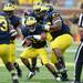 Michigan defensive back Delonte Hollowell runs the ball after recovering a Central Michigan fumble during the second half at Michigan Stadium on Saturday, August 31, 2013. Melanie Maxwell | AnnArbor.com